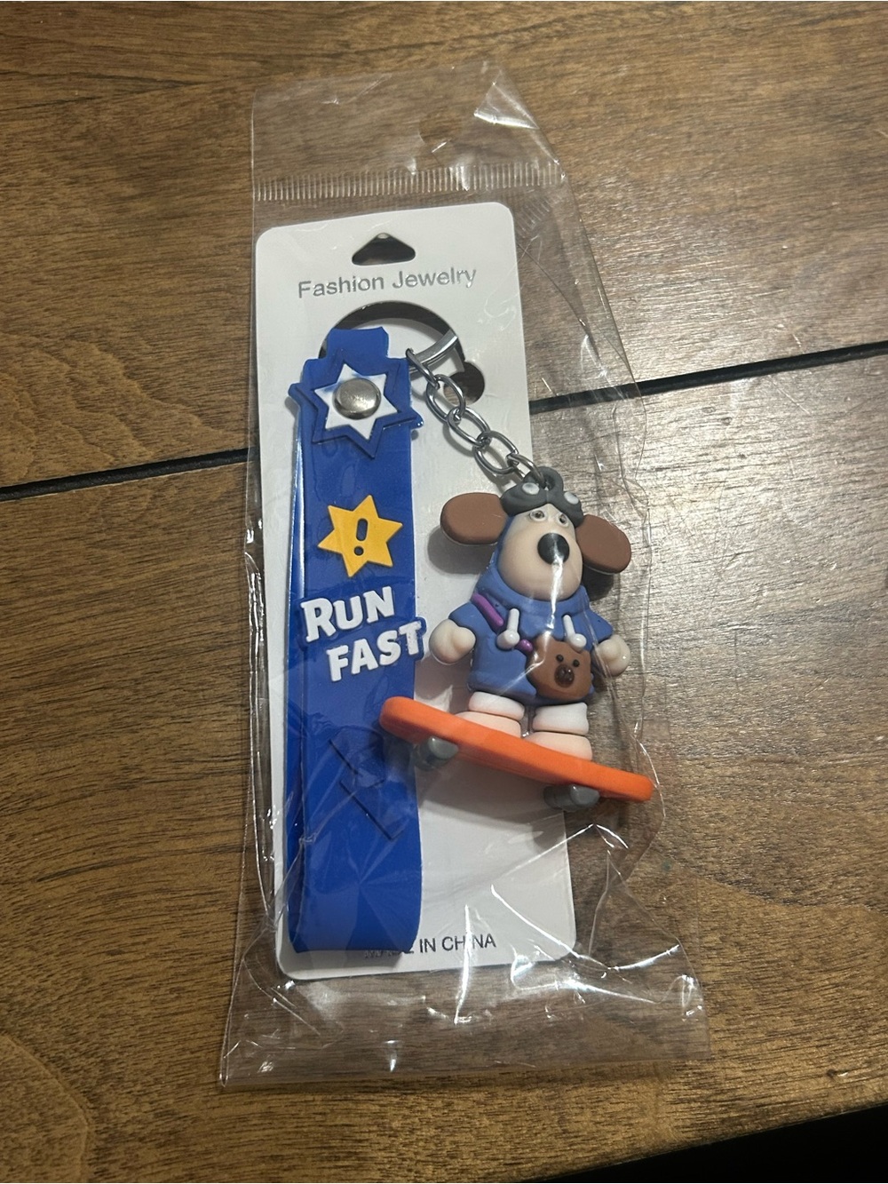Blue 'Run Fast' Dog Skateboarder Keychain for Kids